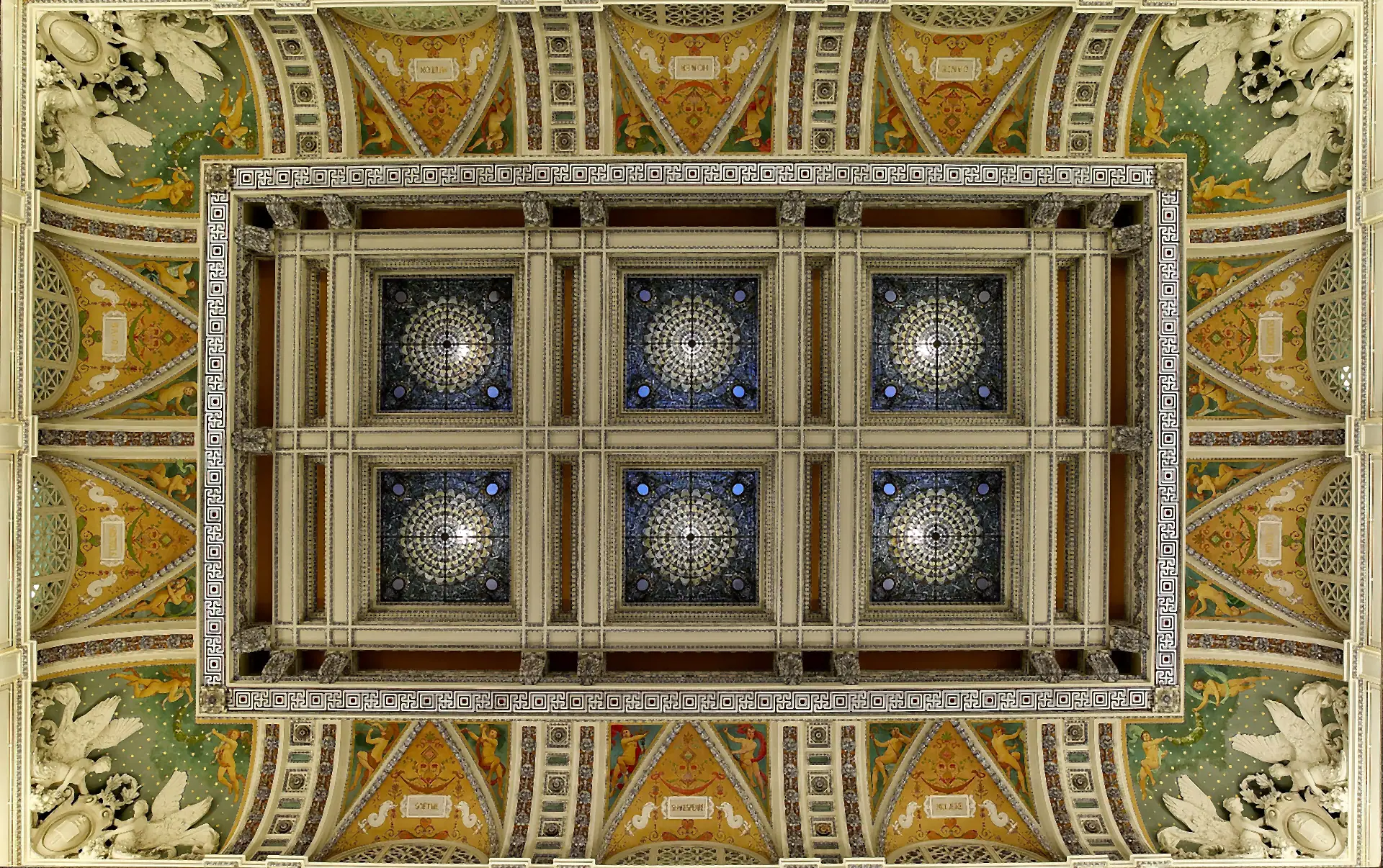 The Great Hall ceiling — stained-glass skylights in a gilded coffered grid.