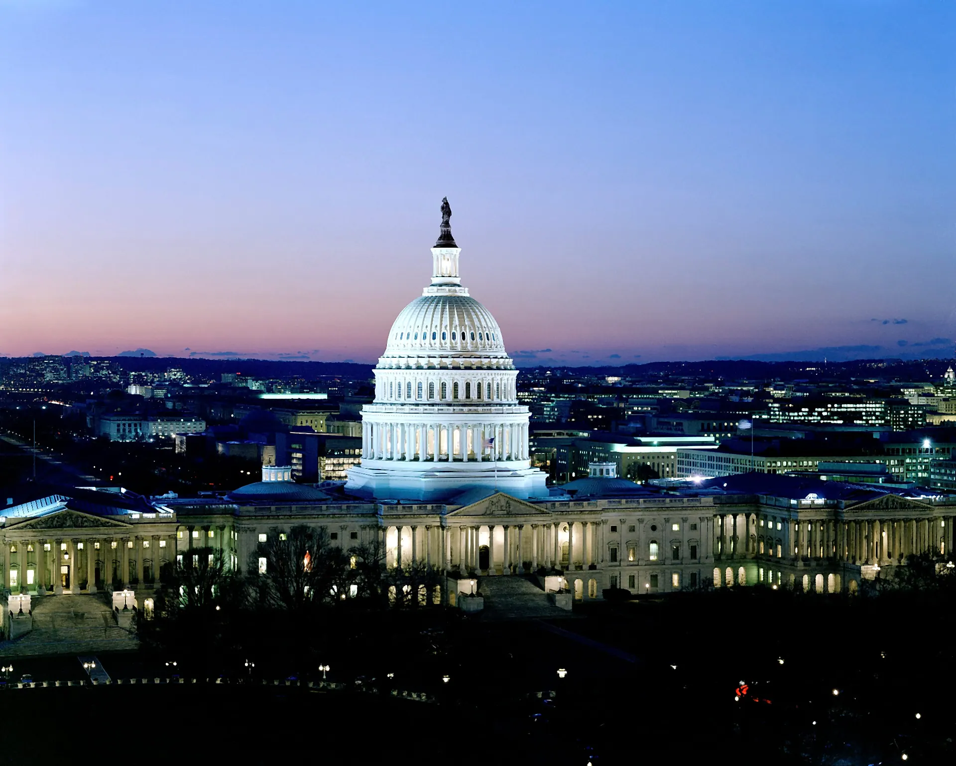 The dome of the United States Capitol at dusk.