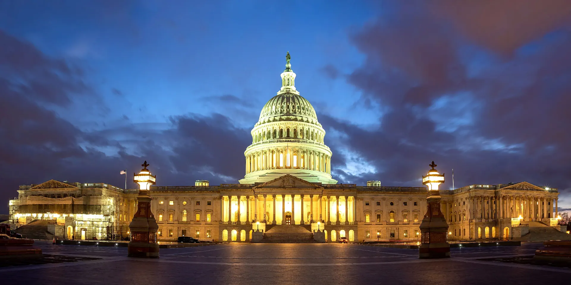 The east front of the United States Capitol at blue hour.